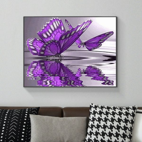 Two Purple Flower Butterflies Playing On The Water